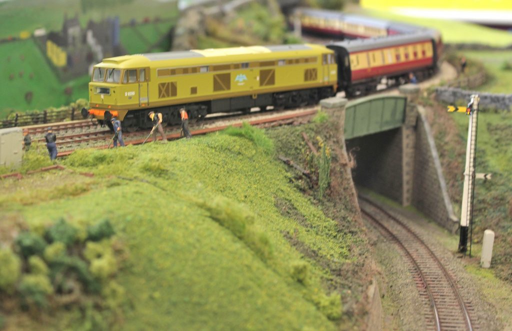 D0260 Falcon in lime green livery on passenger service.